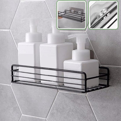 Etagere douche noir montrant grillage accrochée sur ventouse